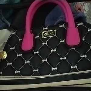 Little shoulder bag with Pink straps and a arm length black strap, black,